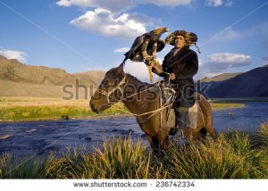 stock-photo-kazakh-men-traditionally-hunt-foxes-and-wolves-using-trained-golden-eagles-236742334